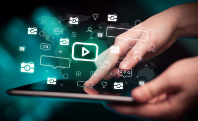 Close-up of a hand using tablet, social media concept