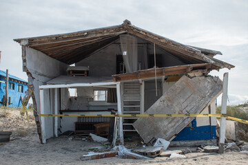 Beach house destroyed by the storm and the ocean in Barra de Valizas, Uruguay