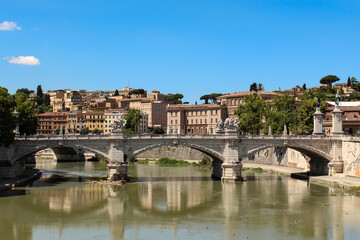 Fototapeta na wymiar Beautiful Vittorio Emanuele bridge and Tiber river in Rome 