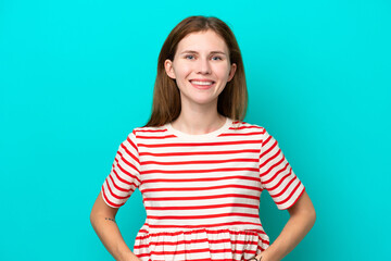 Obraz premium Young English woman isolated on blue background laughing