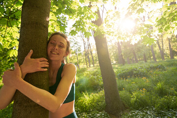 Happy female enjoying integration with green nature
