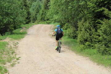 Obraz premium person riding a bicycle