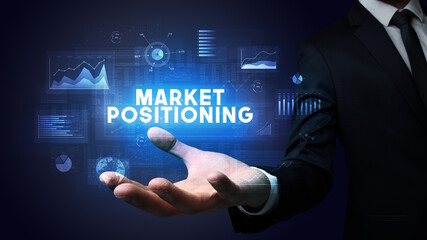 Hand of Businessman holding motivational message