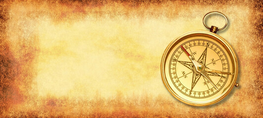 Vintage compass on old paper background
