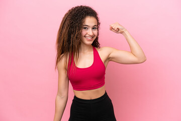 Young Sport Arab woman isolated on pink background