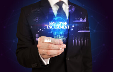 Businessman holding a light bulb, new business concept