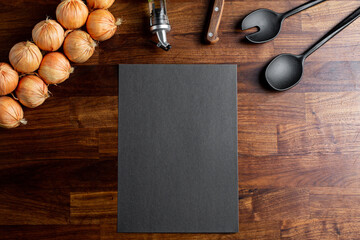 Hipster cafe menu empty mock up for concept design. Business concept. Template design. Information concept with kitchen objects on wooden table 