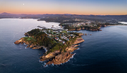Dawn aerial panorama of the coastal town of Eden, NSW Australia