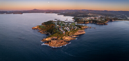 Dawn aerial panorama of the coastal town of Eden, NSW Australia
