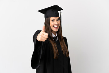 Teenager Brazilian university graduate over isolated white background with thumbs up because something good has happened