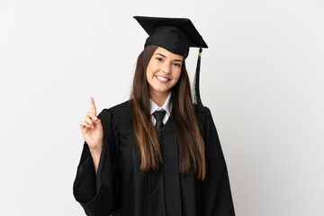 Teenager Brazilian university graduate over isolated white background showing and lifting a finger in sign of the best