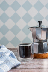 black coffee on a wooden kitchen table