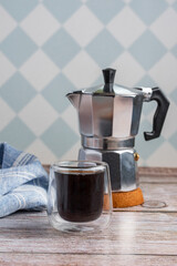 black coffee on a wooden kitchen table