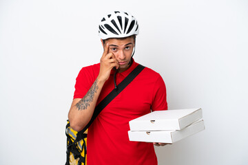 Young Brazilian man with thermal backpack isolated on white background thinking an idea