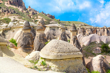 Fairy chimneys rock formations in Pasabag valley in Cappadocia, Turkey. Popular tourist destination in Turkey. © Nikolay N. Antonov
