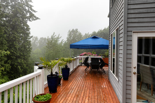 Heavy Rain Storm Cancels Home Outdoor Deck Party