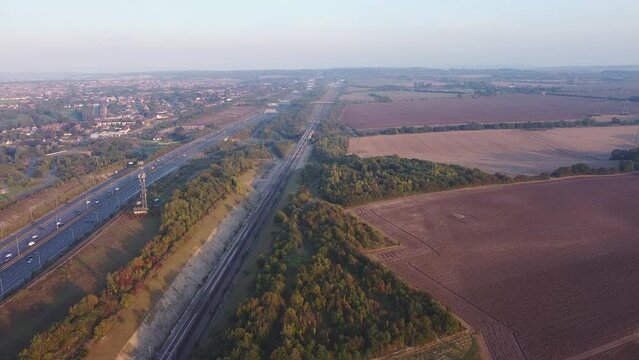 Aerial drone footage of traffic on a motorway in England.
A2 highway in Kent, UK.