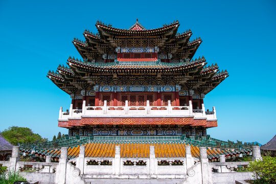 Background image of the back facade of the Tianmen mountain temple, Zhangjiajie, Hunan, China, blue sky with copy space for text