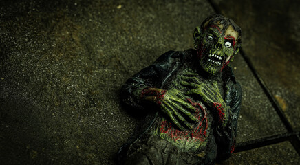 zombie clutching his chest with open wound - obrazy, fototapety, plakaty
