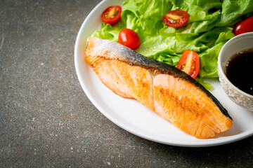 grilled salmon fillet steak with salad