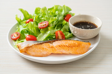 grilled salmon fillet steak with salad
