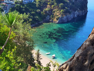 Fototapeta premium parga tourist resort in west greece, valtos beach green waters in summer holidays