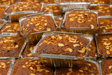 Kolkata, West Bengal, India - 29th Dcemeber 2019 : Plain plum Cakes are being sold at Nahoum and Sons, New Market area. Very famous and more than 100 years old cake shop ,heritage of Kolkata.