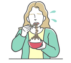 日本食の納豆が苦手で、無理に食べる外国人女性