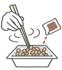 日本食の納豆に醤油を入れて、箸でかき混ぜる