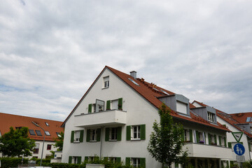 Fototapeta na wymiar Apartment building in Germany, residential complex in Bavaria, beautiful houses