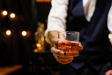 Bartender pouring Whiskey, on  bar,