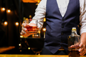 Bartender pouring Whiskey, on  bar,
