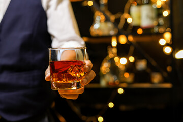 Bartender pouring Whiskey, on  bar,