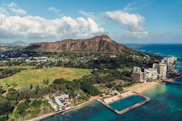 Fototapeten Aerial helicopter view of Diamond Head Mountain and buildings at the foot of the mountain, Honolulu, Oahu © marchello74