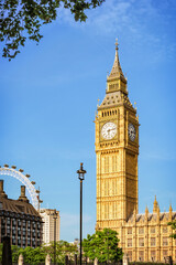 Fototapeta na wymiar Big Ben - Elizabeth Tower in London. 90-meters high clock tower is traditional symbol of London. Copy space in sky.