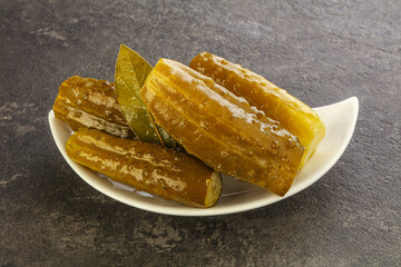 Marinated pickled cucumbers in the bowl