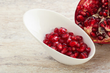 Ripe red Pomegranate seeds in the bowl