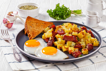 Corned Beef Hash Browns with fried eggs, top view