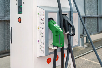 Closeup of electric vehicle charging station ready to use