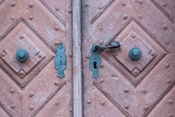 Old vintage decorative door. Abandoned architecture.