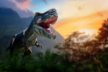 Tyrannosaurus Rex in the jungle. Huge dinosaur against the mountain background of a prehistoric forest