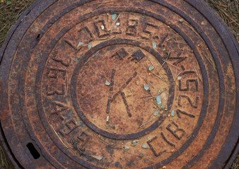 Rusty manhole cap grunge manhole cover with clipping path