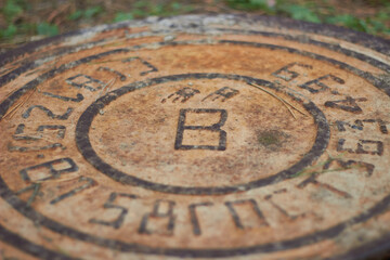 Rusty manhole cap grunge manhole cover with clipping path