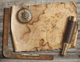 Old torn treasure map with compass and spyglass top view still life. Adventure and travel concept.