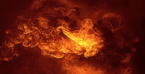 Ink water explosion effect. Orange fire flames. Abstract art background shot on Red Cinema camera 6k.