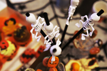 Halloween theme decorated living room. Lifestyle Halloween season family house interior. Traditional Halloween decorations background.