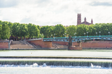 Toulouse cityscape, Saint Pierre Bridge on the Garonne and Jacobin Convent