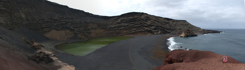 Landscape of El Golfo with Lago Verde and black sands beach. The Green Lagoon of Lanzarote. Canary Islands, Spain.
