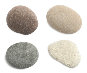 Set with different spa stones on white background