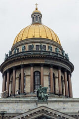 Obraz premium Details of the eastern facade of St. Isaac's Cathedral in St. Petersburg, bronze sculptures, St. Isaac of Dalmatia stops Emperor Valens